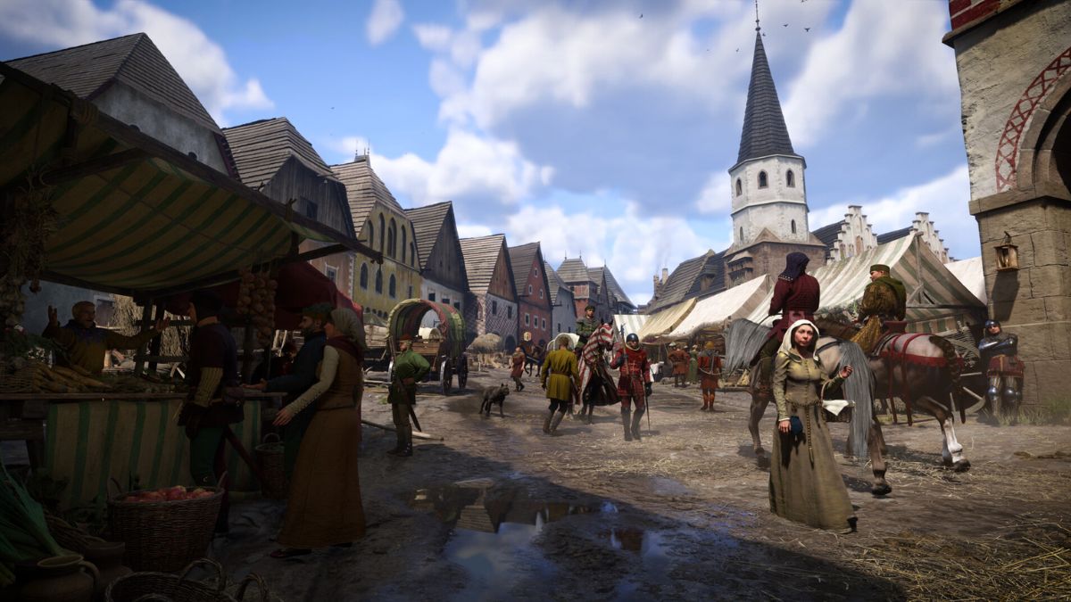 Kuttenburger Bürger flanieren in Kingdom Come Deliverance II durch die Straßen.
