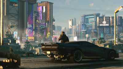 The back of V leaning against a black car in Cyberpunk 2077.