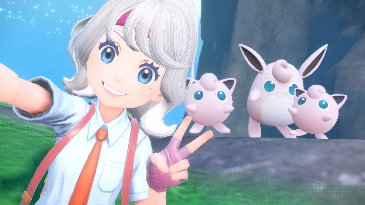 Pokemon Scarlet and Violet screenshot of a player character taking a selfie with Jigglypuff and Wigglytuff