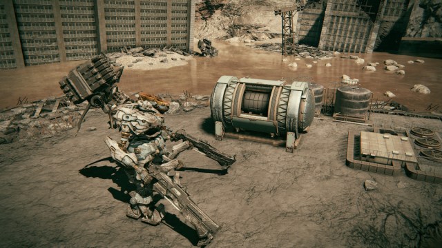 Armored Core 6 screenshot of a player mech standing beside a cylindrical chest on a platform in brown swampy water.