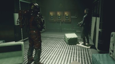 Starfield screenshot of player character standing in a room with companion in front of three electrical boxes.