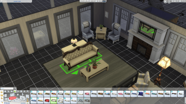A screenshot of a editing a couch's placement in Sims 4.