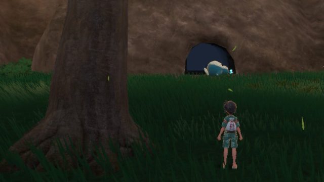 A screenshot of the exterior of the cave with the Masterpiece Teacup item in Pokémon Scarlet and Violet: The Teal Mask.