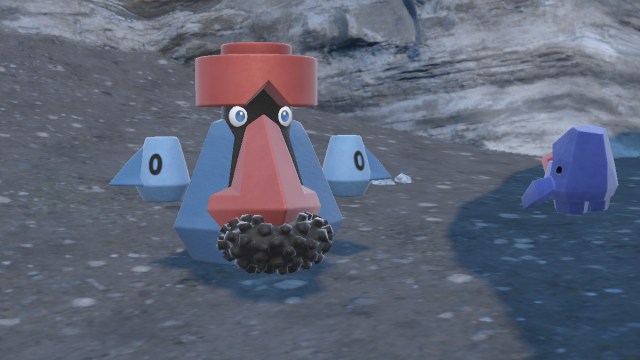 A screenshot of Nosepass and Probopass facing in opposite directions in Pokémon Scarlet and Violet: The Teal Mask.