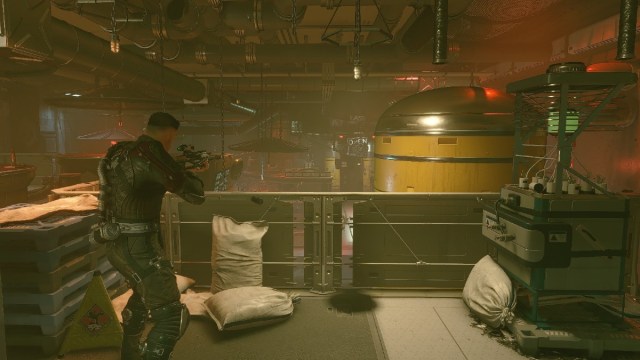 Starfield screenshot of player character holding up and aiming a rifle in front of a railing in a large room.