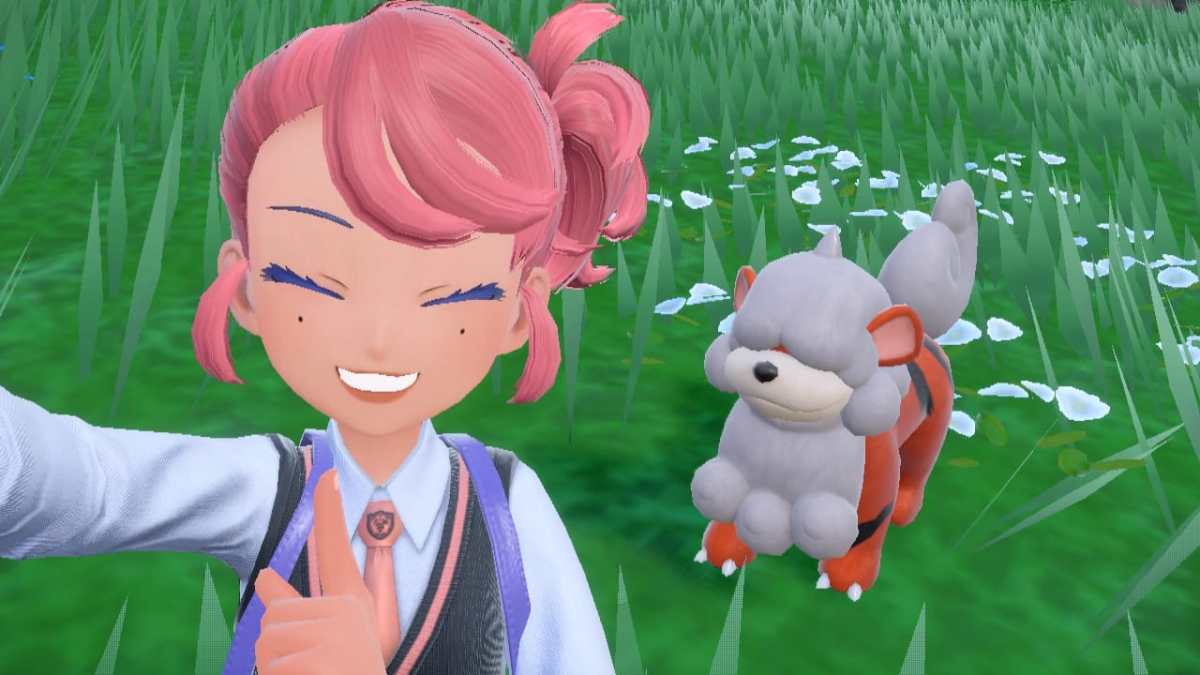 Pokemon Scarlet and Violet player character taking a selfie with Hisuian Growlithe.