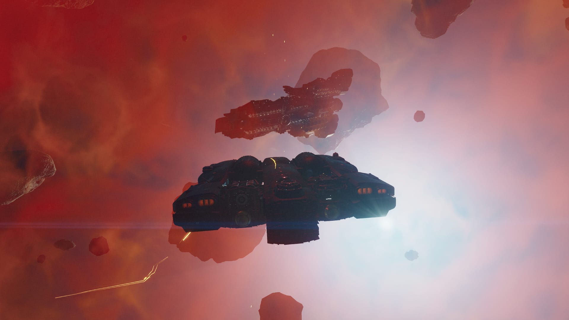 Starfield screenshot of a ship flying through an asteroid-filled red nebula