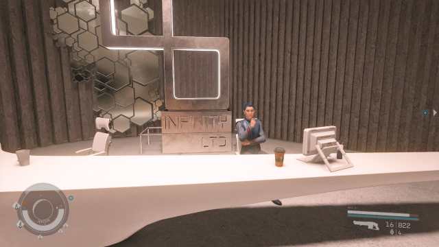 Starfield screenshot of a man sitting at the lobby front desk in the Infinity LTD building.