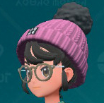A screenshot of a pink Pom Pom Beanie from Pokémon Scarlet and Violet: The Teal Mask.