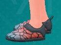 A screenshot of patterned Slip-On footwear from Pokémon Scarlet and Violet: The Teal Mask.
