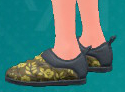 A screenshot of olive foliage Slip-On footwear from Pokémon Scarlet and Violet: The Teal Mask.