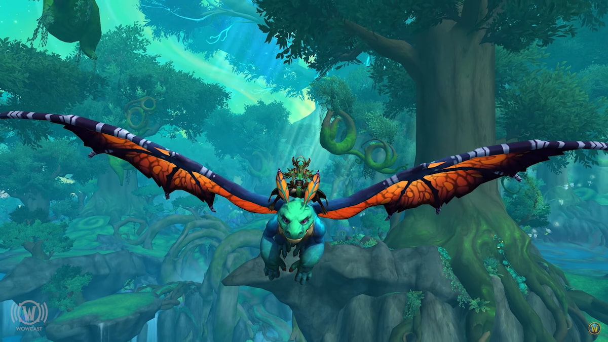 The Faerie Dragon in World of Warcraft spreading its Monarch Butterfly wings as it flies through the emeral ddream.