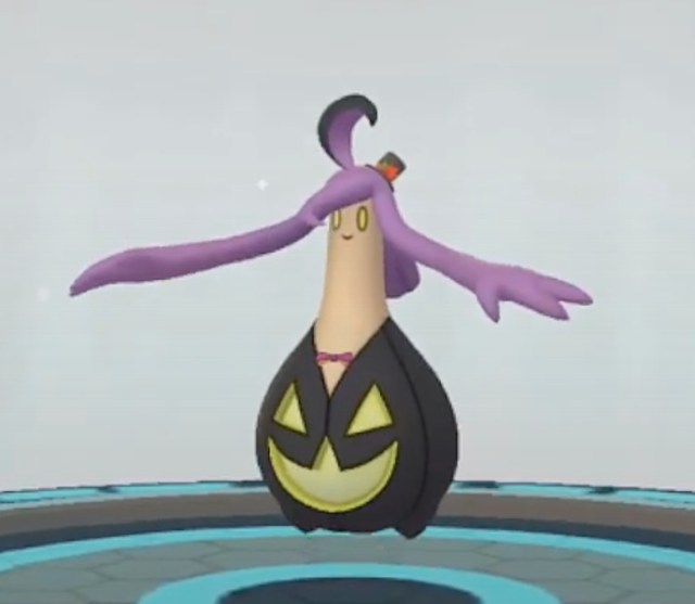 A Pokémon GO screenshot of a shiny Spooky Festival Gourgeist evolving.