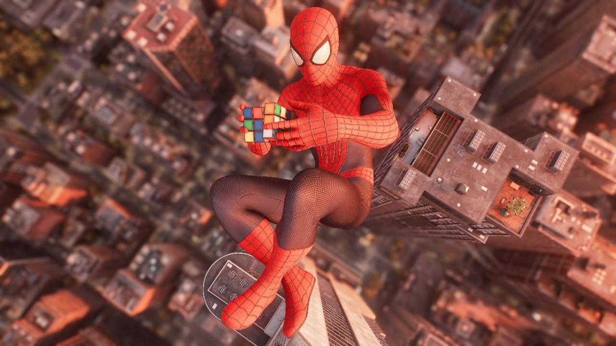 Spider man 2 screenshot of spider man solving a rubik's cube while falling in new york.