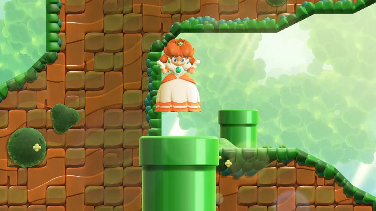 A Super Mario Bros. Wonder screenshot of Daisy going into a secret warp pipe.