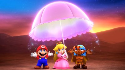 A Super Mario RPG screenshot of Mario, Peach, and Geno underneath a sparkling parasol.