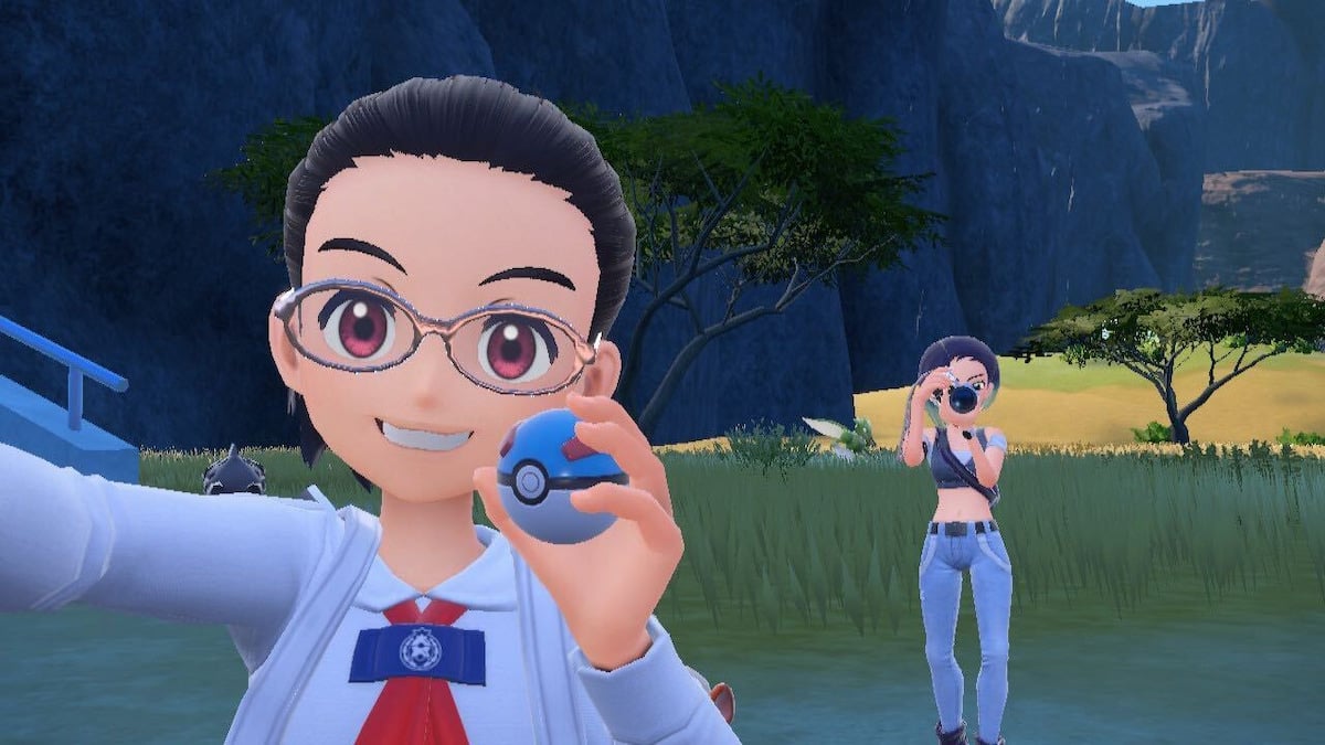 Pokemon Indigo Disk screenshot of a player holding a Pokeball while Perrin is a taking a picture behind them.