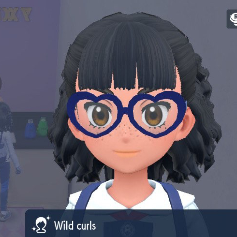 Pokemon Scarlet and Violet screenshot of the wild curls hairstyle.