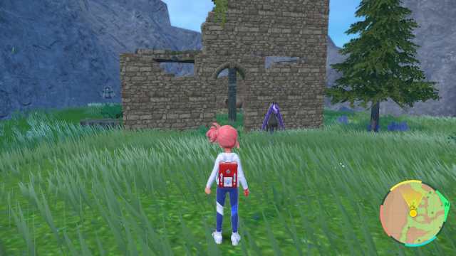 pokemon scarlet and violet screenshot of spectrier standing beside some ruins in paldea.