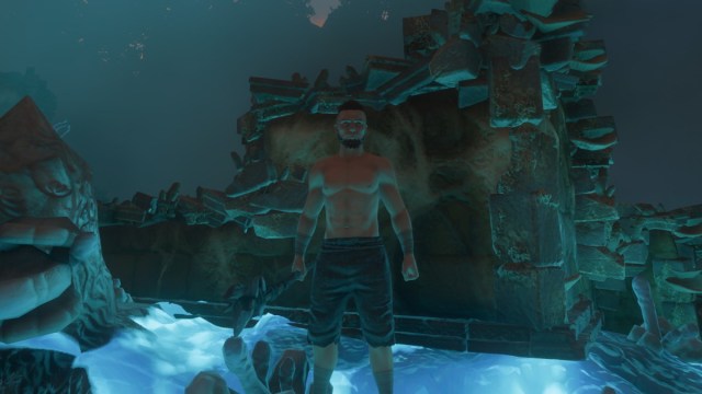 A character is standing barefoot in water in the Enshrouded area.
