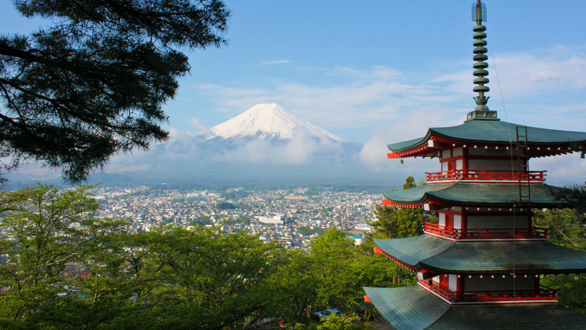 A photo of a pagoda overlooking Mt. Fuji in Fujiyoshida, Japan.