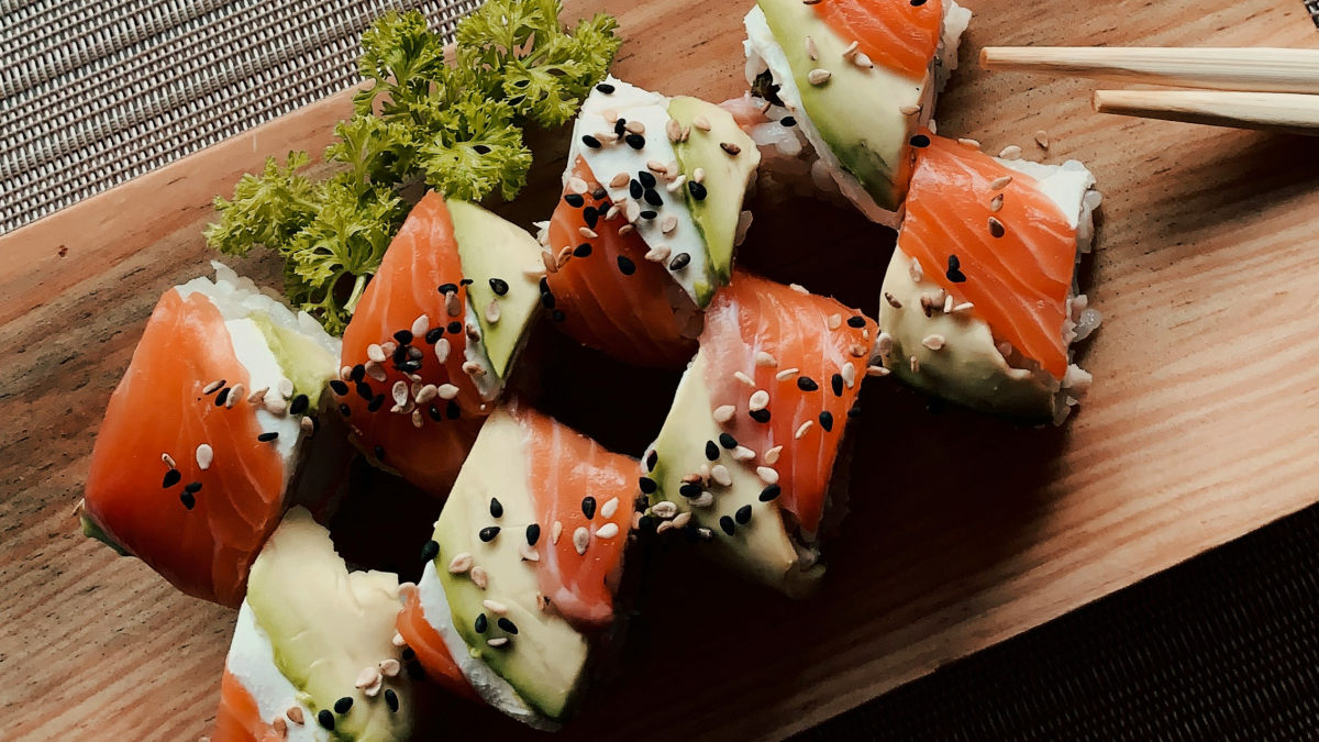 A photograph of a plate of sushi.