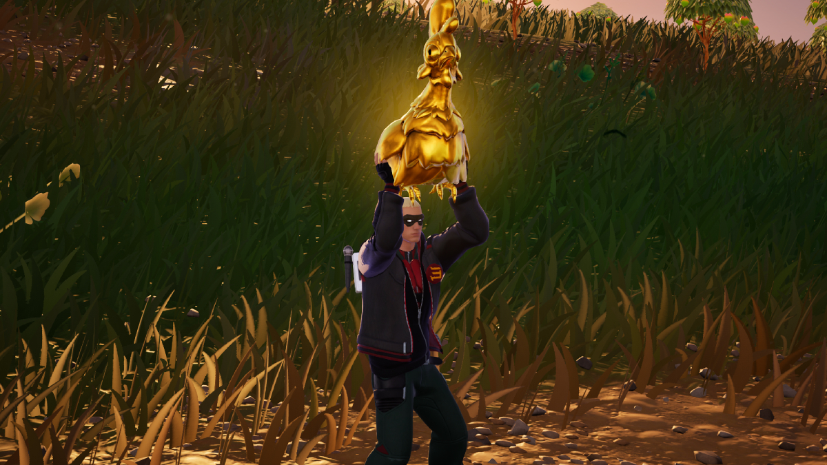 Slim Shady holding a Golden Chicken above his head in Fortnite Chapter 5 Season 2.