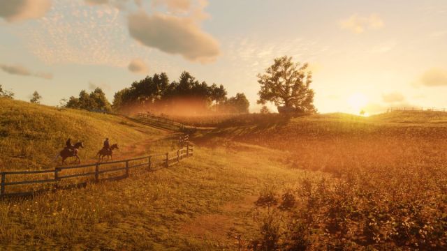 Red Dead Redemption 2 key art featuring two riders on a plain during a sunrise.