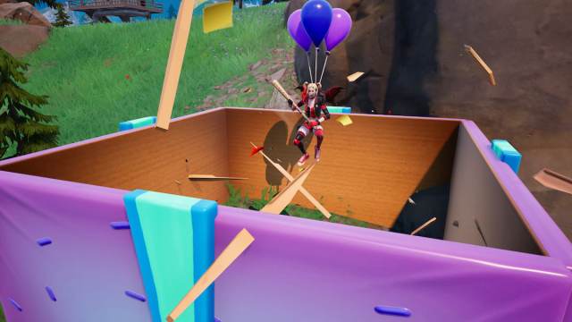 harley quinn jumping out of a birthday present in fortnite