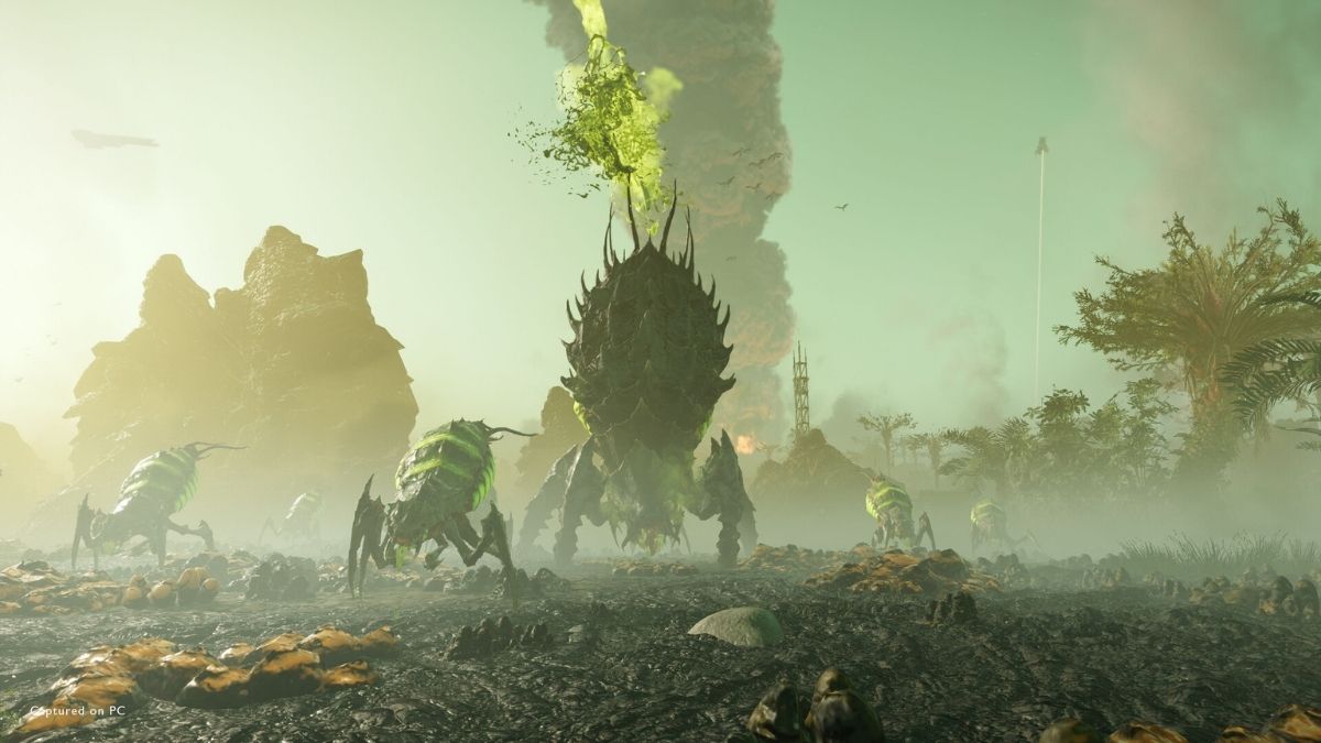 Giant bugs on an alien landscape in Helldivers 2.