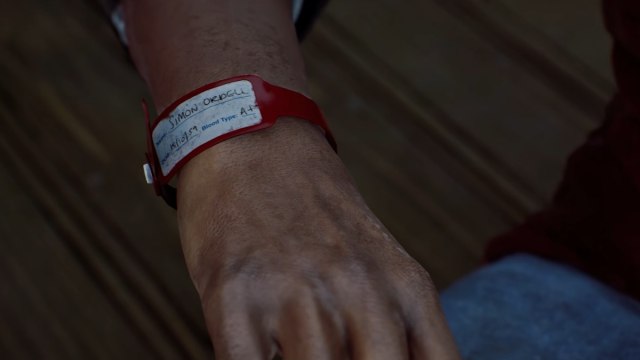 close up of simon ordell's patient wristband