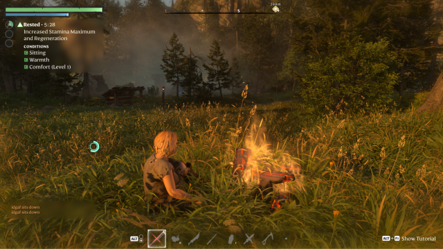 Enshrouded character resting near a campfire
